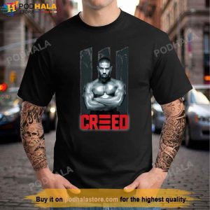 Adonis Creed Arms Crossed Above Logo Shirt